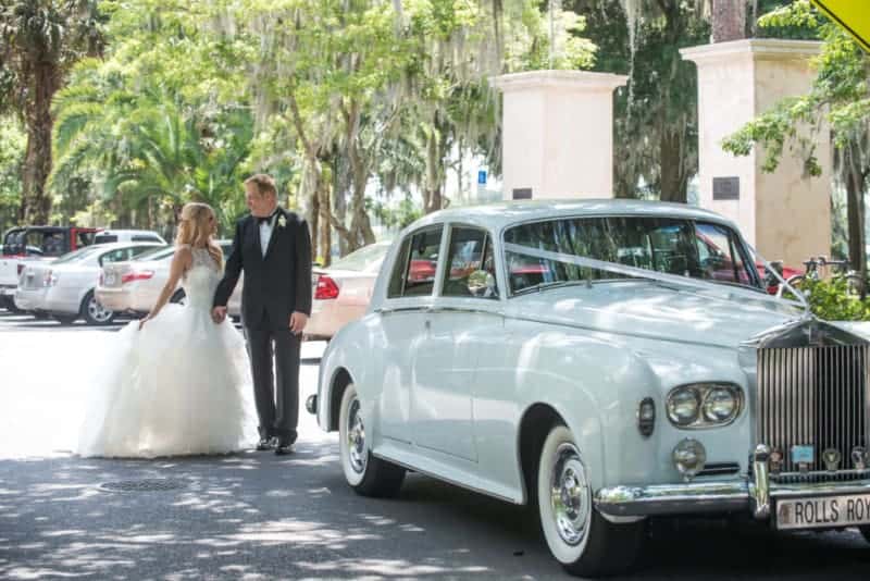 Bride and Groom with a Classic Limo at Kraft Azalea Park