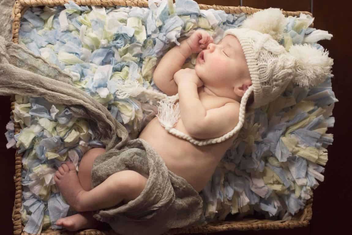 Sleeping Newborn Baby near window