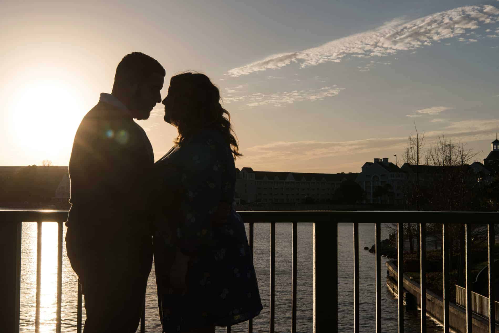 Engaged Couple share a Disney Sunset with each other