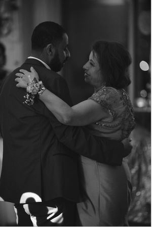 Mother and Son dance during an unplugged wedding