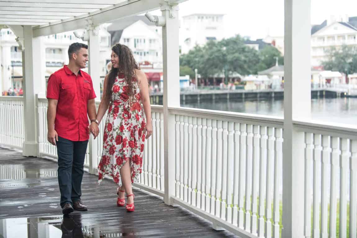 Cute Couple Enjoying Their Romantic Boardwalk Engagement Photos